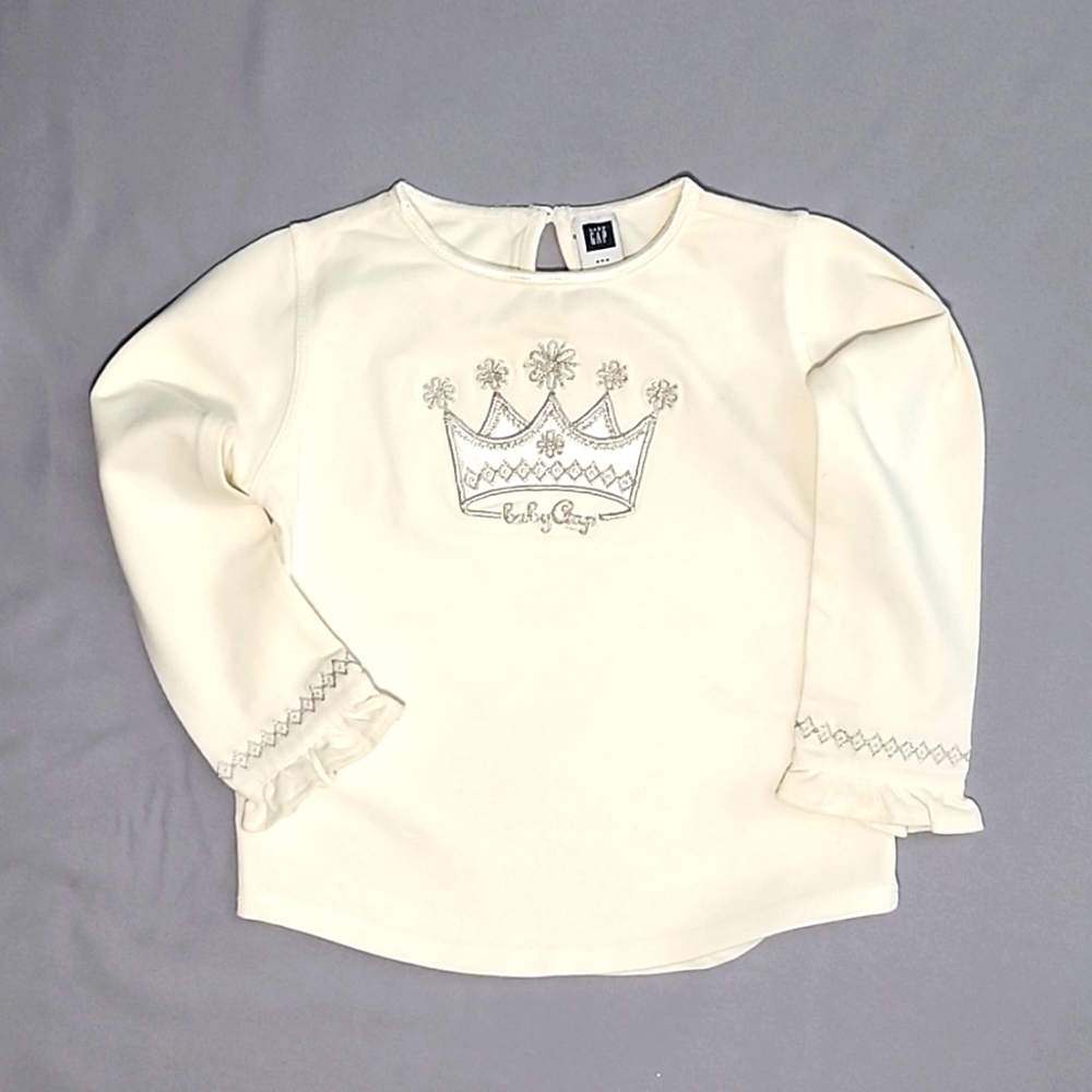 Baby Gap cream long sleeve silver (crown) shirt. Size: Toddler 2 years.